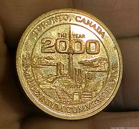 Obverse showing skyline, CN Tower, Year 2000 inscription