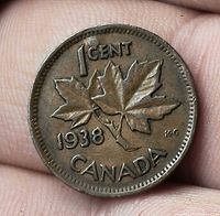 Reverse of 1938 Canadian 1 cent coin with maple leaf design