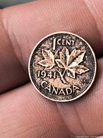 Reverse: maple leaf design, date 1941, denomination 1 cent, initials K·G