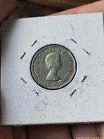 Obverse of 1961 Canadian 5-cent coin in 2×2 holder showing Queen Elizabeth II