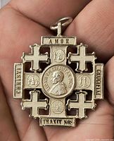 Obverse of silver Jerusalem cross medal showing papal portrait and inscriptions