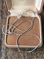 Sterling silver snake chain in open box
