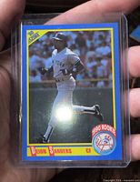 Front of Deion Sanders 1990 Score rookie card in plastic holder