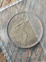 Reverse showing seated Britannia and date 1936