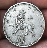 Reverse of 10 New Pence coin showing crowned lion and denomination