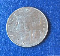 Obverse showing female bust, denomination and date