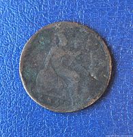 Obverse side of worn copper penny