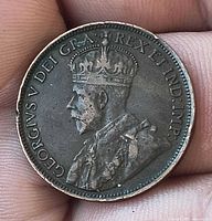 Obverse showing King George V portrait and legend GEORGIVS V DEI GRA REX ET IND IMP