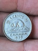 Reverse side showing beaver design, denomination and date