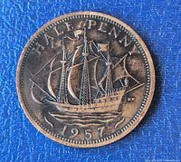 Reverse of 1957 half penny showing ship design