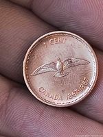 Reverse showing rock dove and CANADA 1867-1967 inscription