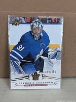 Front of Frederik Andersen serial-numbered UD Exclusives hockey card in sleeve