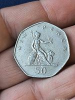 Reverse showing seated Britannia, NEW PENCE legend and value 50