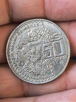 Reverse side showing Aztec goddess Coyolxauhqui, denomination 50, year 1982, mint mark