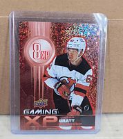 Front of Jesper Bratt Gaming XP holographic card in sleeve