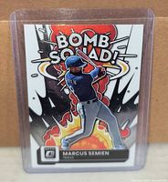 Front view of Marcus Semien Bomb Squad Donruss Optic card in holder