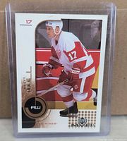 Front view of Brett Hull Upper Deck MVP hockey card in hard plastic top loader