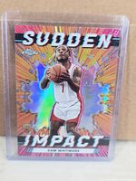 Front of Topps Chrome Sudden Impact Cam Whitmore rookie holo card in protective sleeve
