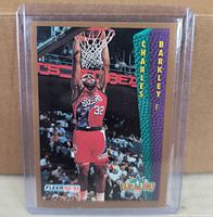 Front of Charles Barkley Fleer 92-93 Slam Dunk card in sleeve