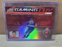 Front of Upper Deck Connor McDavid Gaming FOV holographic card in sleeve