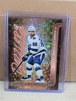 Front of holographic Dazzlers card in sleeve