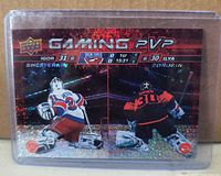 Front of Upper Deck Gaming PVP dual goalie card in holder