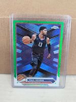 Front of Topps Chrome Paul George card in top loader