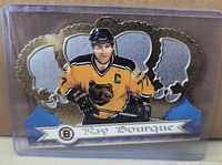 Front view of Ray Bourque Crown Royale die-cut card in sleeve