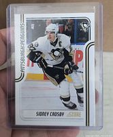 Front of Sidney Crosby Score card in plastic holder