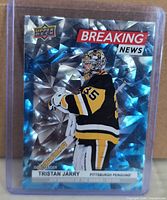 Front of Upper Deck Breaking News BN-7 Tristan Jarry holographic card in top loader