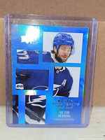 Front of Victor Hedman UD Portraits Blue holographic card in sleeve
