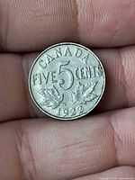 Reverse showing CANADA FIVE 5 CENTS 1922 with maple leaves