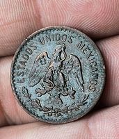 Obverse showing eagle with snake and full legend