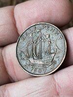 Reverse showing ship design and date 1947