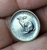 Reverse showing rabbit design and 5 Cents legend