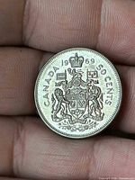 Reverse side displaying CANADA 1969 50 CENTS legend