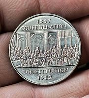 Reverse of 1982 Constitution dollar showing Confederation meeting design