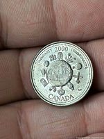Reverse of Canada 2000 Community quarter