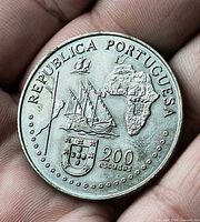 Obverse of 200 escudos coin showing ship, Africa outline and denomination