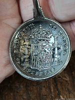 Bowl shows Spanish coat of arms and "5 PESETAS" legend
