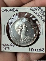 Obverse view of 1971 Canada dollar in 2×2 holder