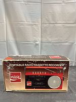 Front of worn retail box showing product image and branding