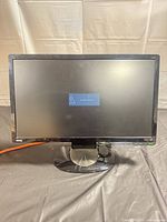 Front view of BenQ G2220HD monitor powered on showing no signal message