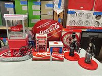Group shot of all Coca-Cola items on table