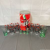 Group shot showing all glasses and coin bank