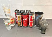 All 12 Coca-Cola drinkware pieces displayed together