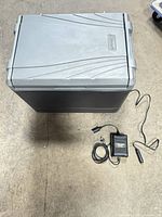 Cooler closed with both power cables laid out