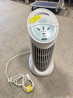 Front view of Honeywell tower fan with power cord visible