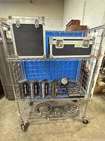 Full lot view: two flight cases, four Match 45 dimmer packs, par can, controller, cables