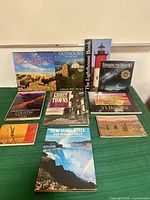 All ten books front covers visible